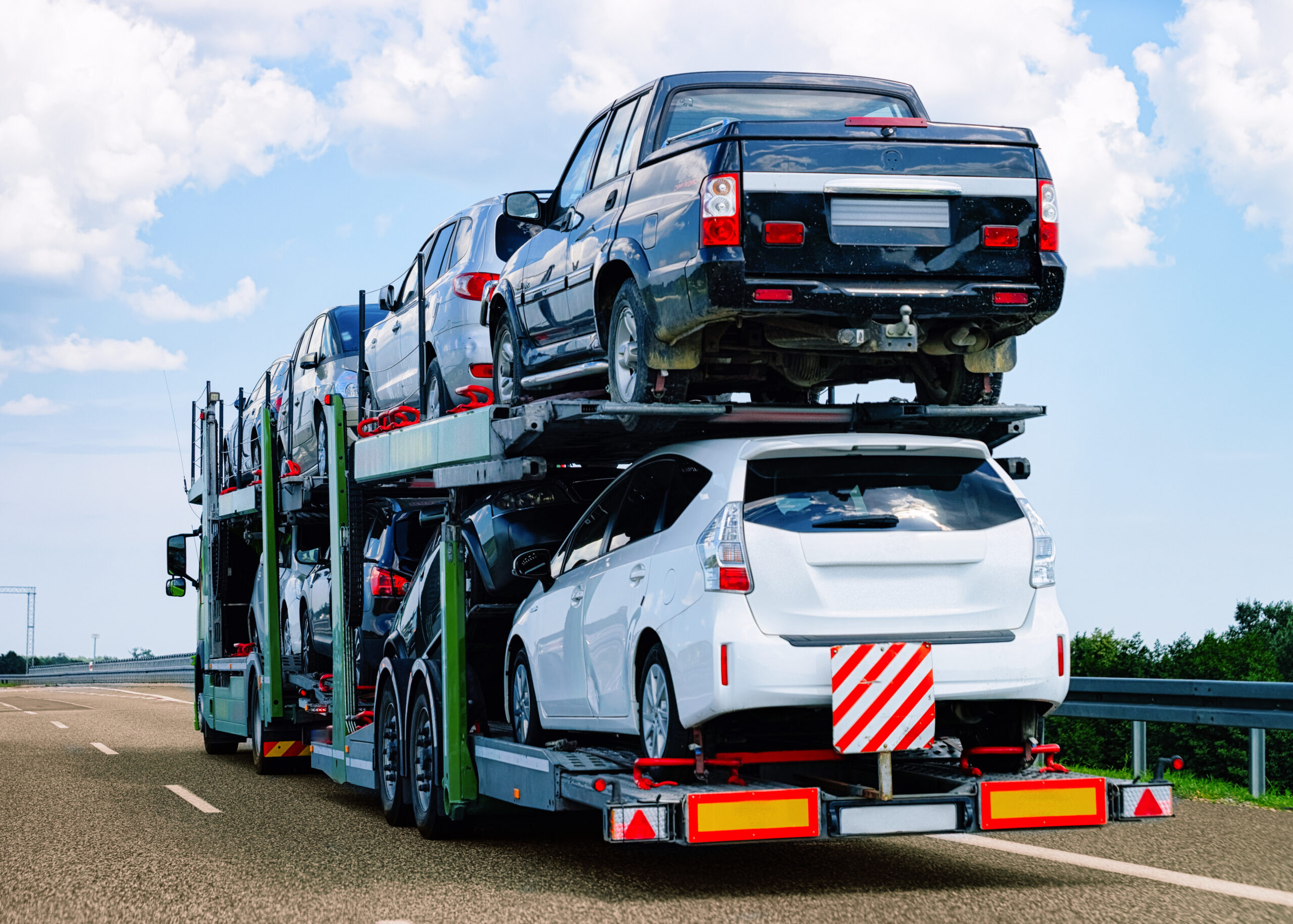 You are currently viewing Auto Transport Essentials: Your Guide to Vehicle Shipping Options, Costs, and Preparation